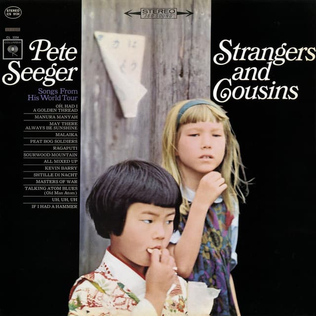 Strangers and Cousins: Songs from His World Tour cover