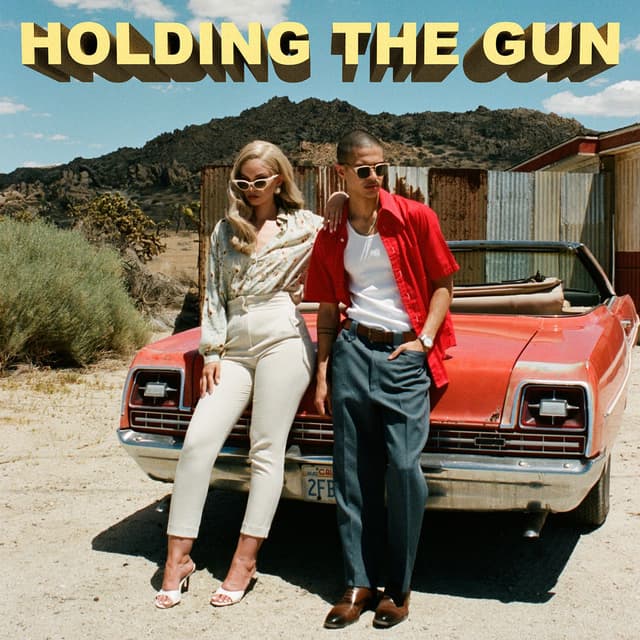 Holding the Gun cover