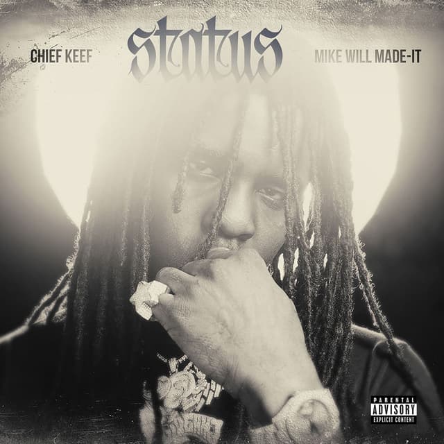 STATUS cover